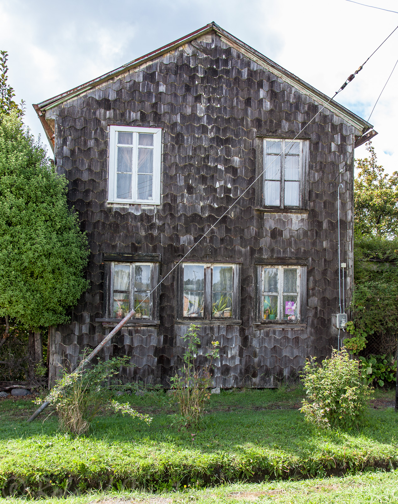 Couverture carractéristique en plaquettes de bois des façades